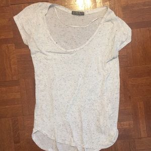 White scoop neck shirt